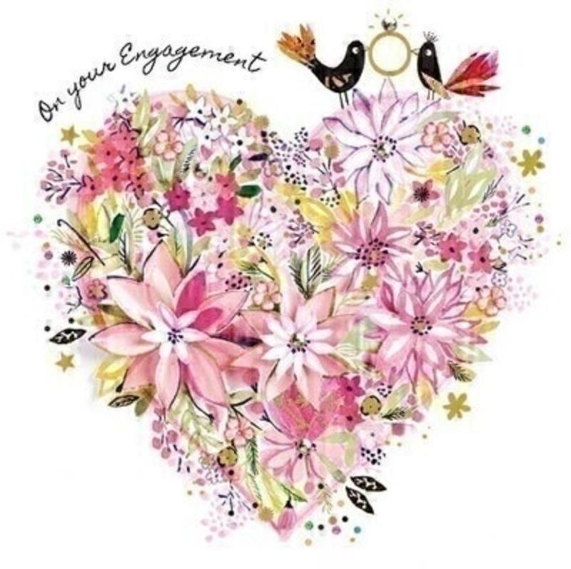 This Engagement greetings card from Paper Rose is decorated with two love birds holding an engagment ring sitting on a heart made from pink flowers and ON YOUR ENGAGEMENT written on the front. The card is perfect to send to someone celebrating an Engagement and it has Wishing You All The Happiness In The World written on the inside. Comes complete with a pink envelope.